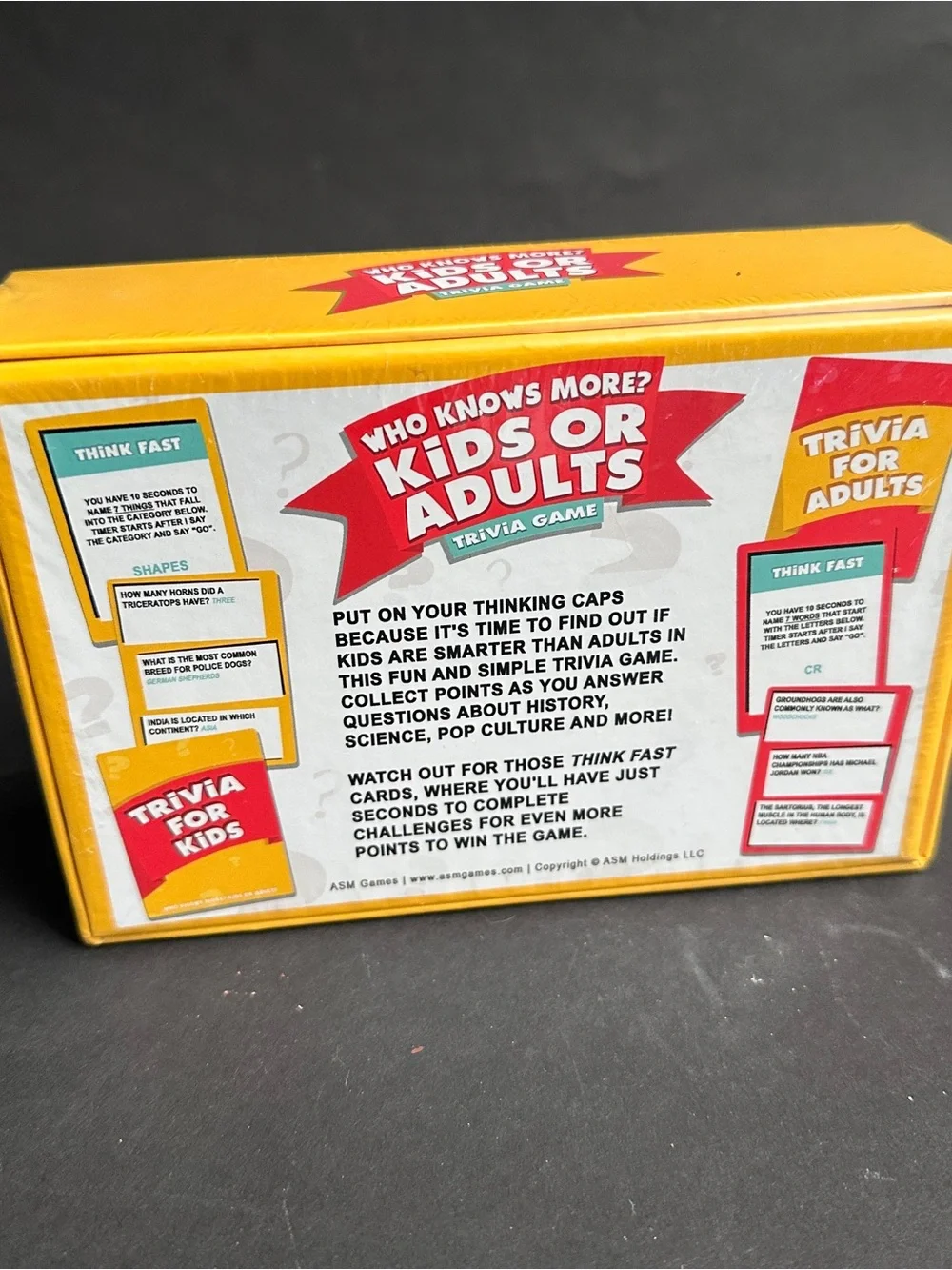 NEW- Who Knows More? Kids or Adults Trivia Game - Yellow/Red